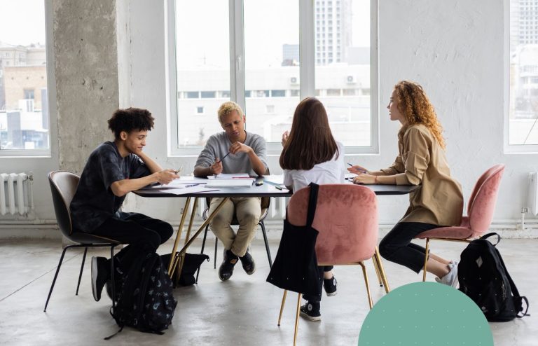 Leader using the Decision Making tree with her team around a table.